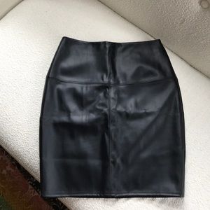 Super cute black leather mini skirt! Size 2!